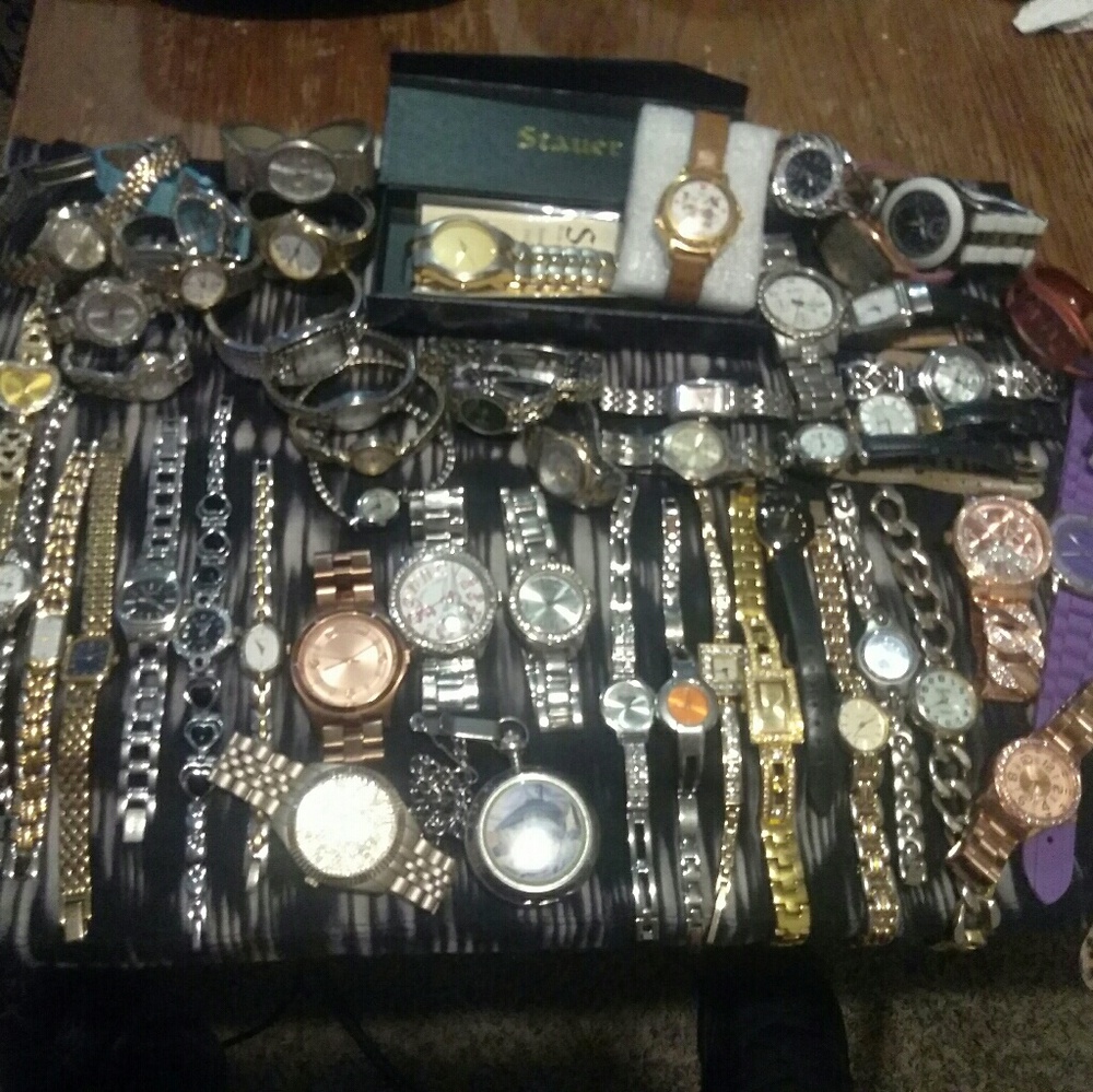 A pretty nice collection of 54 Watches